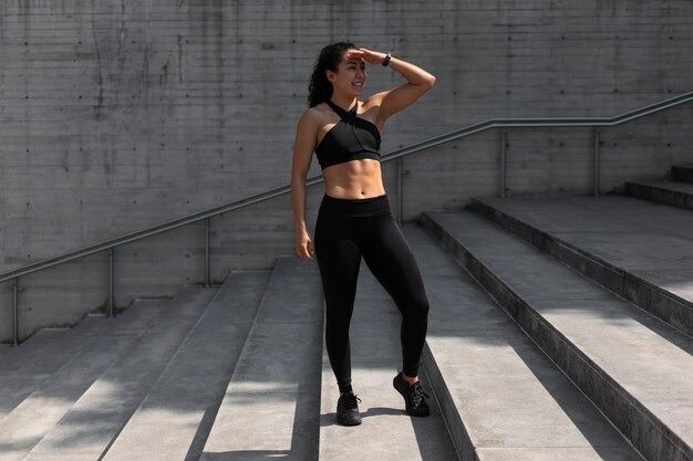 athletic-woman-outdoors-exercisi